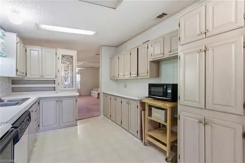 Kitchen - 11250 Stringfellow Rd, Bokeelia, FL 33922 photo 4 of 5