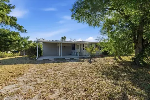 Exterior - 11250 Stringfellow Rd, Bokeelia, FL 33922 photo 3 of 8