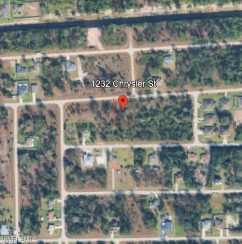 1232 Chrysler St, Lehigh Acres, FL 33974