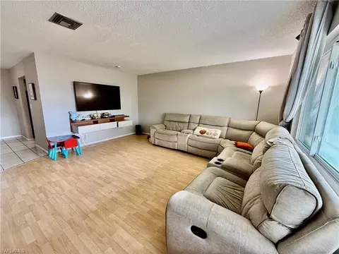 Living - 720 Shadyside St, Lehigh Acres, FL 33936 photo 4 of 4
