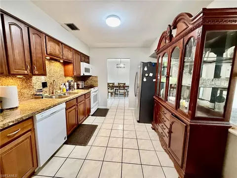 Kitchen - 720 Shadyside St, Lehigh Acres, FL 33936 photo 2 of 2