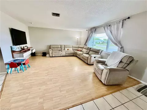 Living - 720 Shadyside St, Lehigh Acres, FL 33936 photo 2 of 4
