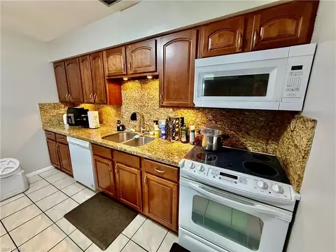 Kitchen - 720 Shadyside St, Lehigh Acres, FL 33936 photo 1 of 2