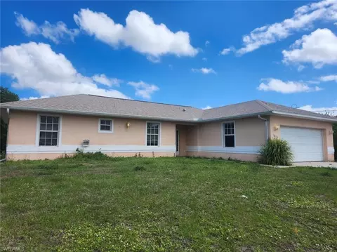1055 Peach St, Lehigh Acres, FL 33974