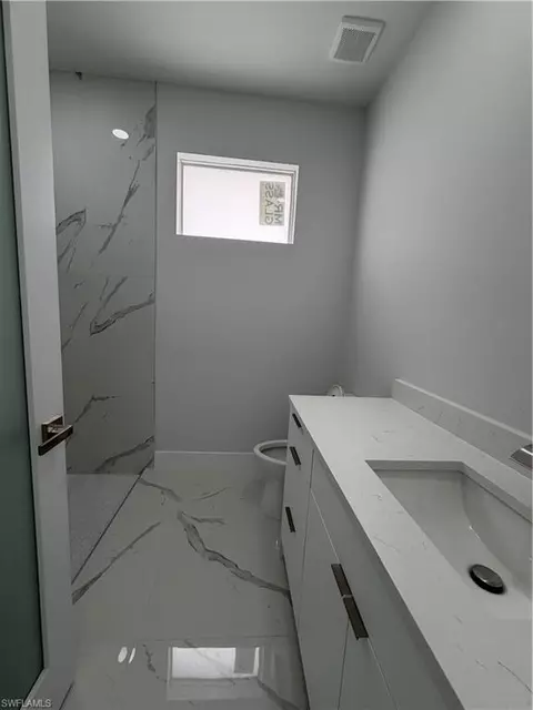 Bath - 846 Runble St E, Lehigh Acres, FL 33974 photo 2 of 4