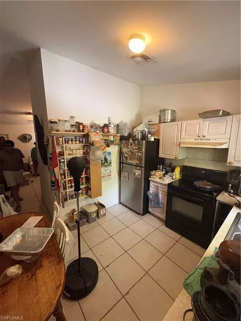 Kitchen - 3123 Pine Tree Dr, Naples, FL 34112 photo 4 of 5