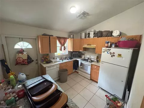 Kitchen - 3123 Pine Tree Dr, Naples, FL 34112 photo 2 of 5