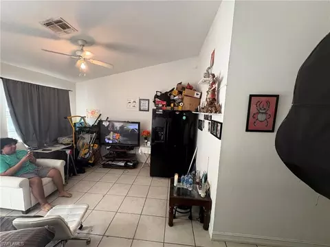 Living - 3123 Pine Tree Dr, Naples, FL 34112 photo 2 of 2