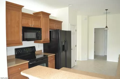 Kitchen - 20561 Larino Loop, Estero, FL 33928 photo 2 of 2