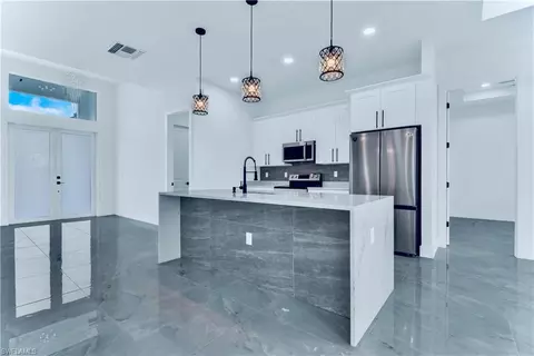 Kitchen - 654 Trinity St E, Lehigh Acres, FL 33974 photo 1 of 3