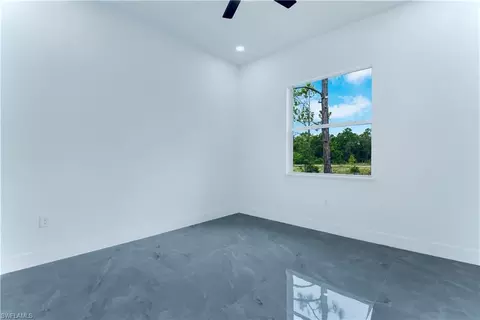 Bedroom - 654 Trinity St E, Lehigh Acres, FL 33974 photo 3 of 5