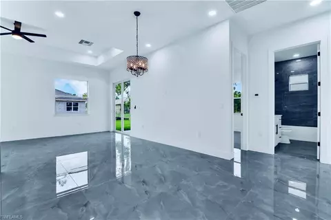 Living - 654 Trinity St E, Lehigh Acres, FL 33974 photo 1 of 4