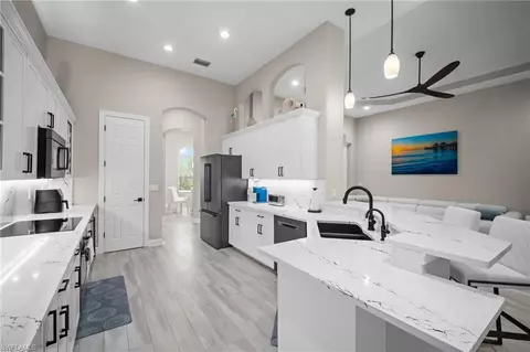 Kitchen - 9042 Bronco Ct, Naples, FL 34113 photo 2 of 3