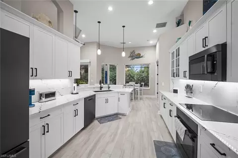 Kitchen - 9042 Bronco Ct, Naples, FL 34113 photo 3 of 3