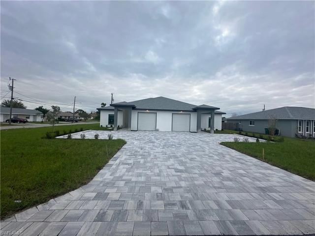702-704 SE 8th Ter, Cape Coral, FL 33990