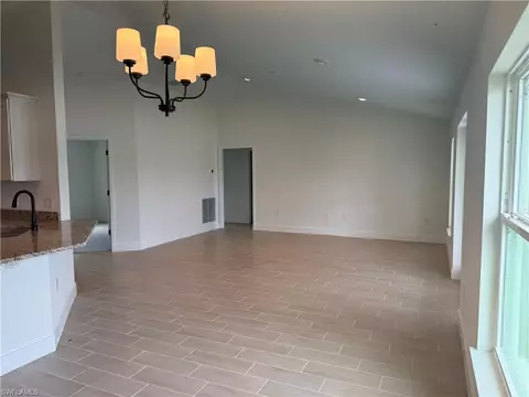 Living - 486 Willowbrook Dr, Lehigh Acres, FL 33972 photo 2 of 3