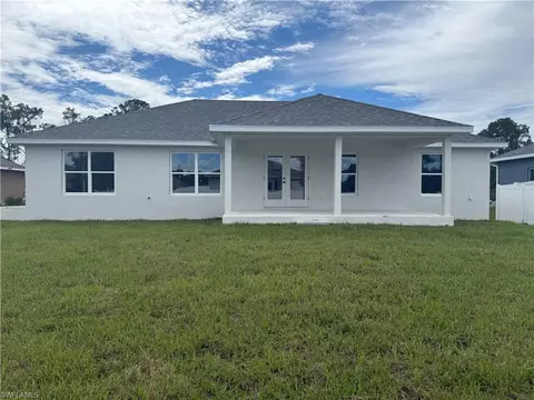 Exterior - 486 Willowbrook Dr, Lehigh Acres, FL 33972 photo 3 of 5