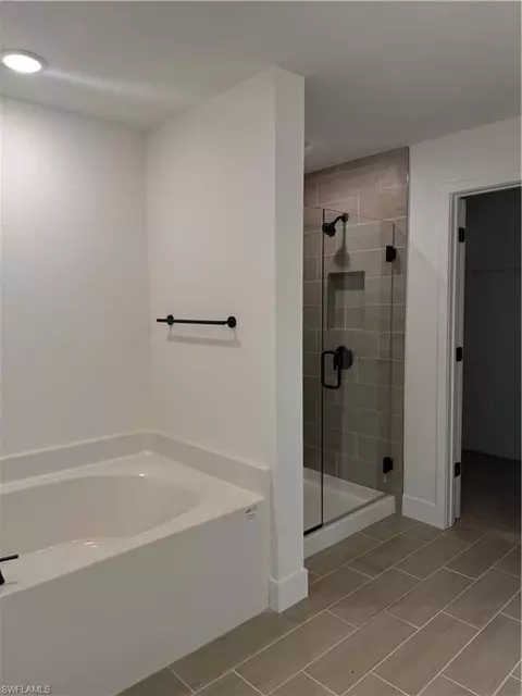 Bath - 486 Willowbrook Dr, Lehigh Acres, FL 33972 photo 4 of 6