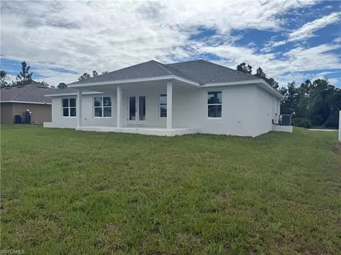 Exterior - 486 Willowbrook Dr, Lehigh Acres, FL 33972 photo 2 of 5