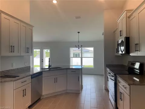 Kitchen - 486 Willowbrook Dr, Lehigh Acres, FL 33972 photo 1 of 3