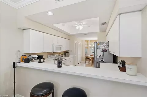 Kitchen - 8045 Tiger Cv #502, Naples, FL 34113 photo 5 of 5