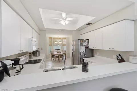 Kitchen - 8045 Tiger Cv #502, Naples, FL 34113 photo 4 of 5