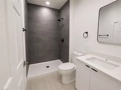 Bath - 666 Topeka Ct, Lehigh Acres, FL 33972 photo 2 of 2