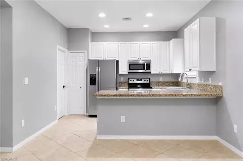 Kitchen - 10191 Tin Maple Dr #88, Estero, FL 33928 photo 1 of 2
