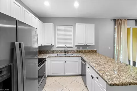 Kitchen - 10191 Tin Maple Dr #88, Estero, FL 33928 photo 2 of 2