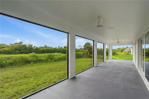 Exterior - 645 Whitmore Loop, Lehigh Acres, FL 33972 photo 3 of 4