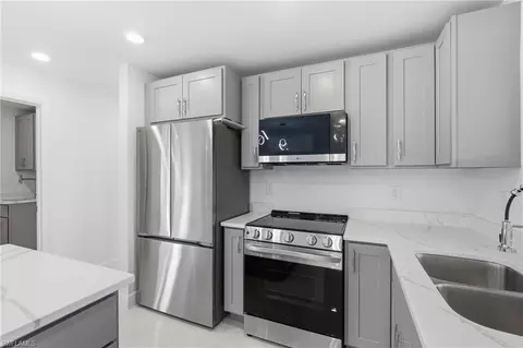 Kitchen - 645 Whitmore Loop, Lehigh Acres, FL 33972 photo 2 of 4