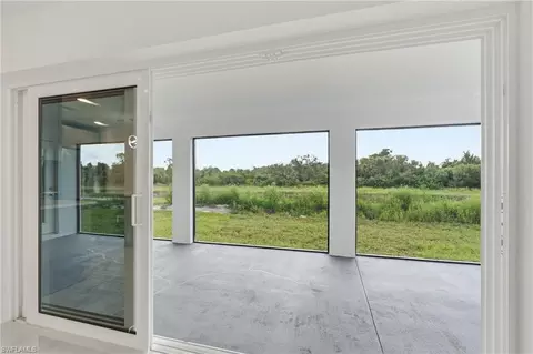 Exterior - 645 Whitmore Loop, Lehigh Acres, FL 33972 photo 2 of 4