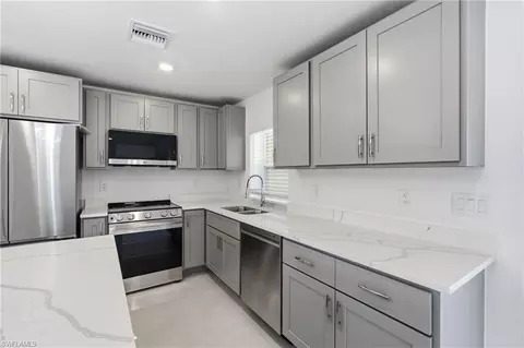 Kitchen - 645 Whitmore Loop, Lehigh Acres, FL 33972 photo 3 of 4