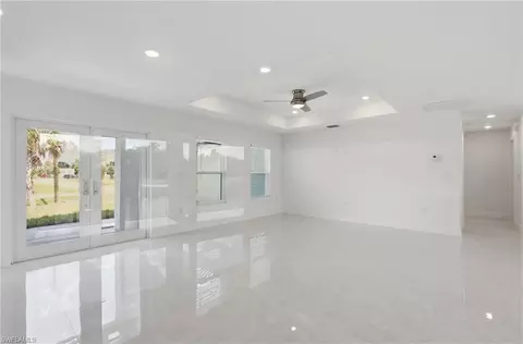 Living - 645 Whitmore Loop, Lehigh Acres, FL 33972 photo 1 of 7