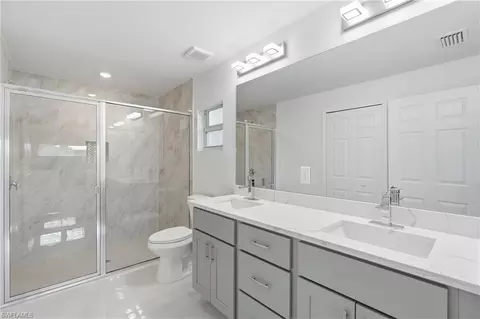 Bath - 645 Whitmore Loop, Lehigh Acres, FL 33972 photo 2 of 4
