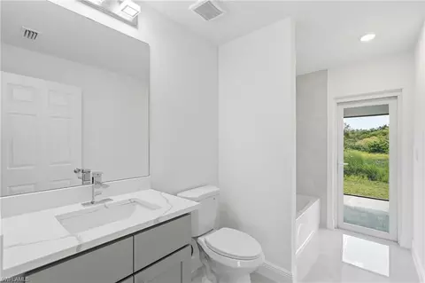 Bath - 645 Whitmore Loop, Lehigh Acres, FL 33972 photo 3 of 4