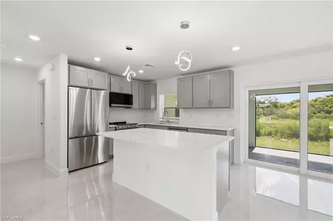 Kitchen - 645 Whitmore Loop, Lehigh Acres, FL 33972 photo 4 of 4