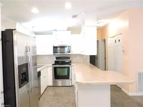 Kitchen - 20701 Garden Dr, Estero, FL 33928 photo 2 of 2