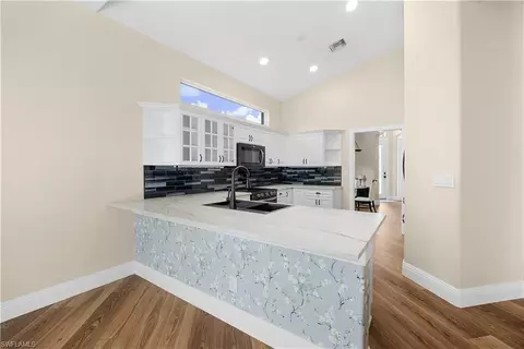 Kitchen - 8070 Tauren Ct S, Naples, FL 34119 photo 2 of 2
