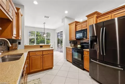 Kitchen - 20592 Larino Loop, Estero, FL 33928 photo 3 of 3