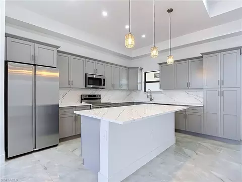 Kitchen - 103 Ruby Ave N, Lehigh Acres, FL 33971 photo 6 of 6