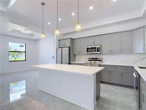 Kitchen - 103 Ruby Ave N, Lehigh Acres, FL 33971 photo 2 of 6