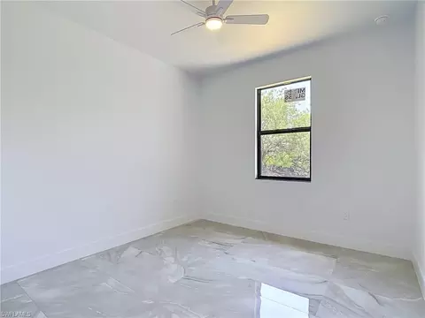 Bedroom - 103 Ruby Ave N, Lehigh Acres, FL 33971 photo 2 of 6