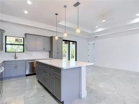 Kitchen - 103 Ruby Ave N, Lehigh Acres, FL 33971 photo 5 of 6