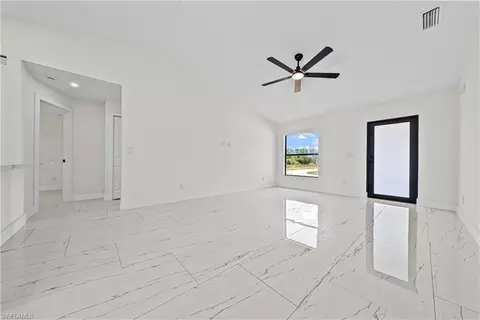 Living - 4507 E 10th St, Lehigh Acres, FL 33972 photo 3 of 4