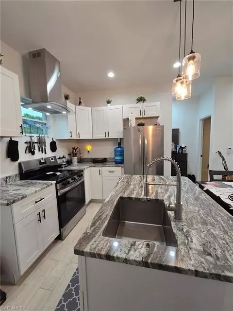 Kitchen - 23041 Roundtree Ave, Alva, FL 33920 photo 2 of 3