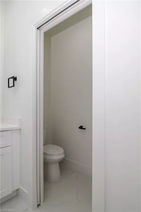Bath - 943 Commodore St, Lehigh Acres, FL 33974 photo 3 of 5
