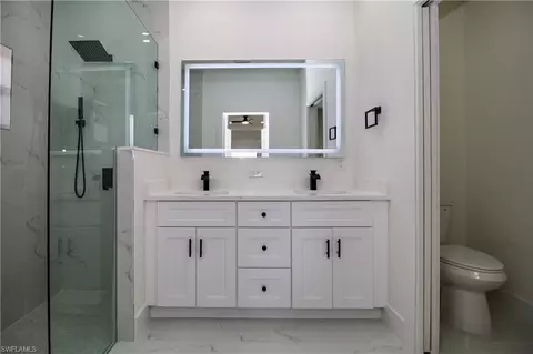 Bath - 943 Commodore St, Lehigh Acres, FL 33974 photo 1 of 5