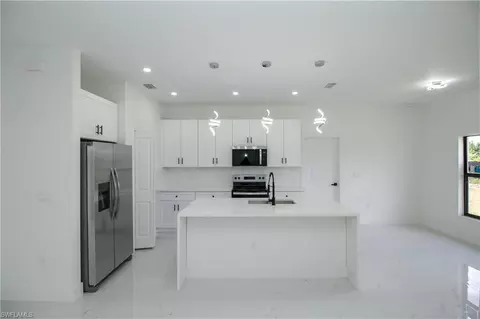 Kitchen - 943 Commodore St, Lehigh Acres, FL 33974 photo 1 of 2