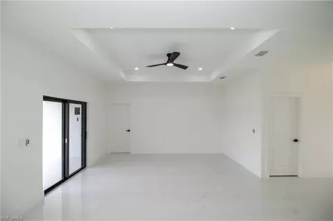 Living - 943 Commodore St, Lehigh Acres, FL 33974 photo 1 of 1